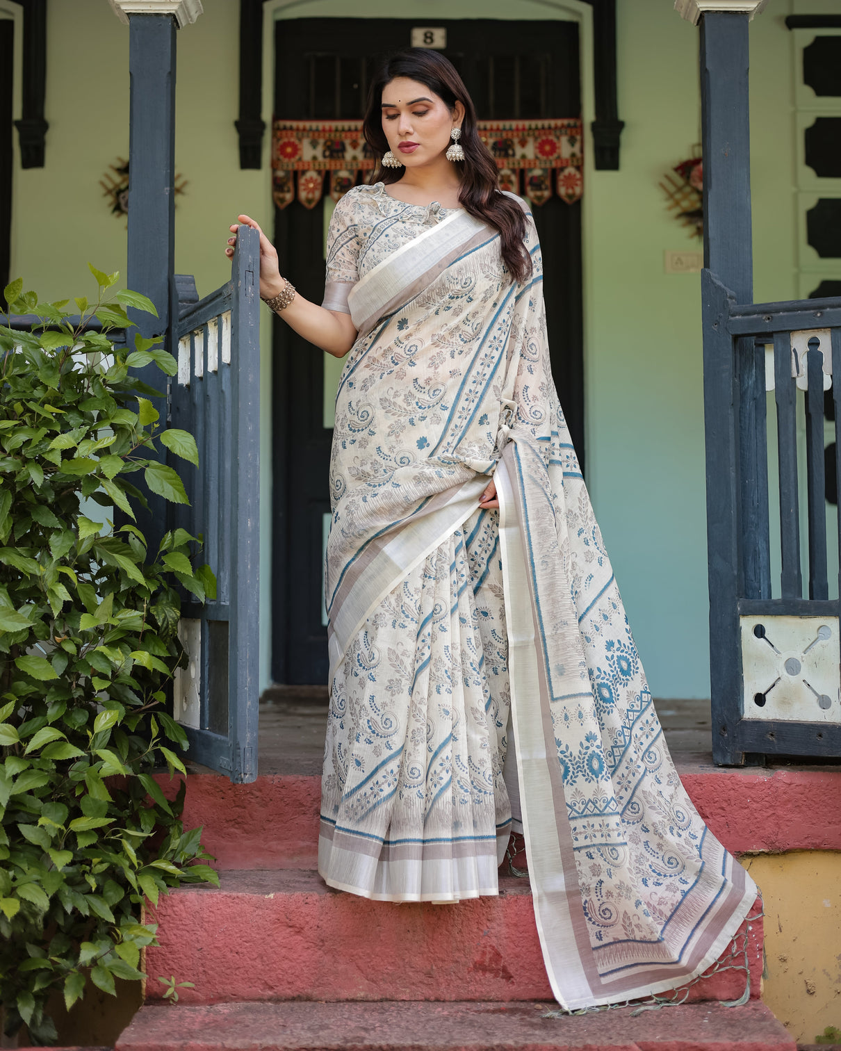 Beige and blue floral printed pure cotton linen saree with blouse and tassels