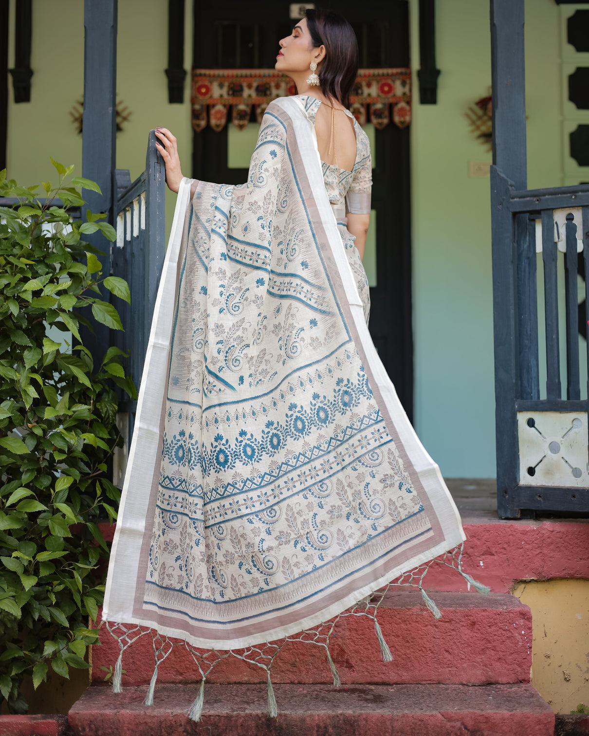 Beige and blue floral printed pure cotton linen saree with blouse and tassels