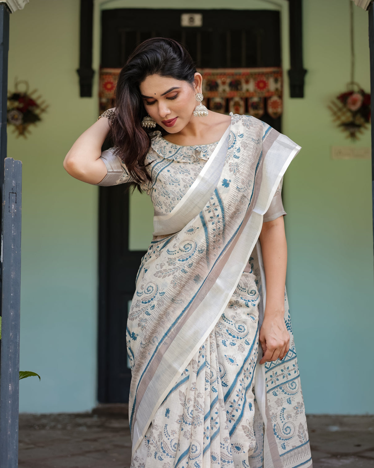Beige and blue floral printed pure cotton linen saree with blouse and tassels