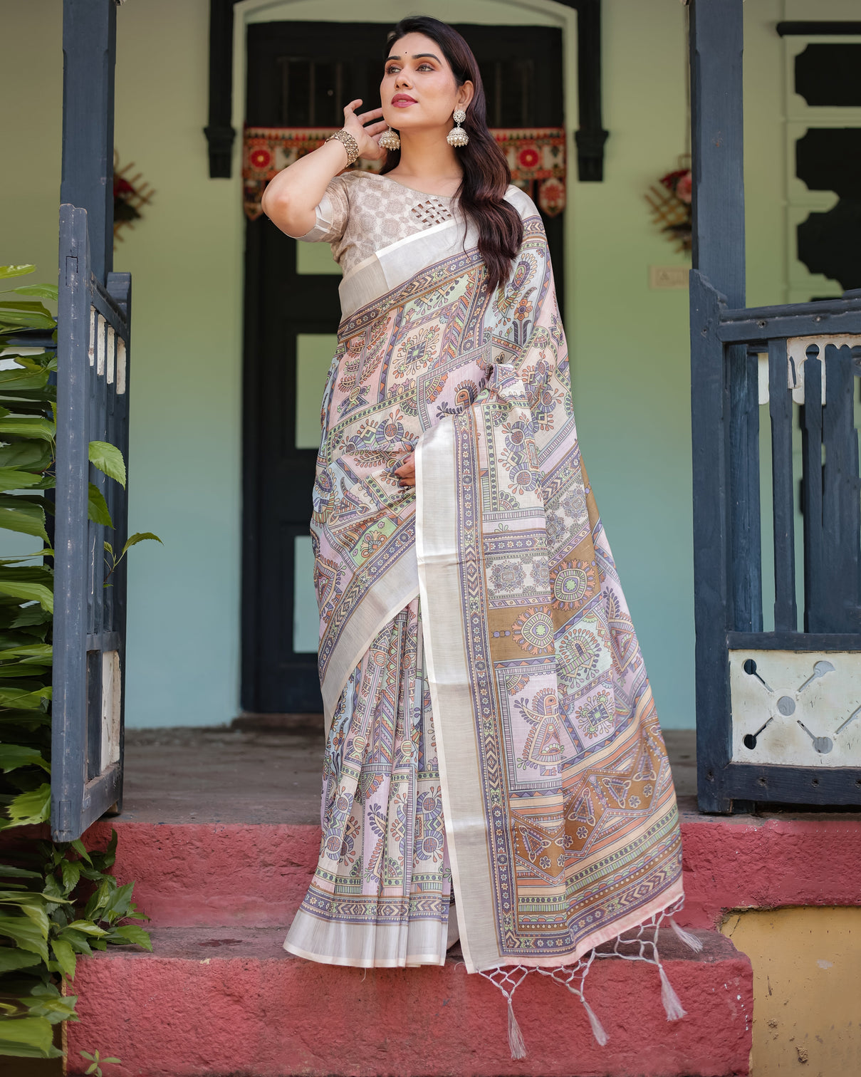Cream and pastel multicolour printed pure cotton linen saree with blouse and tassels on edges