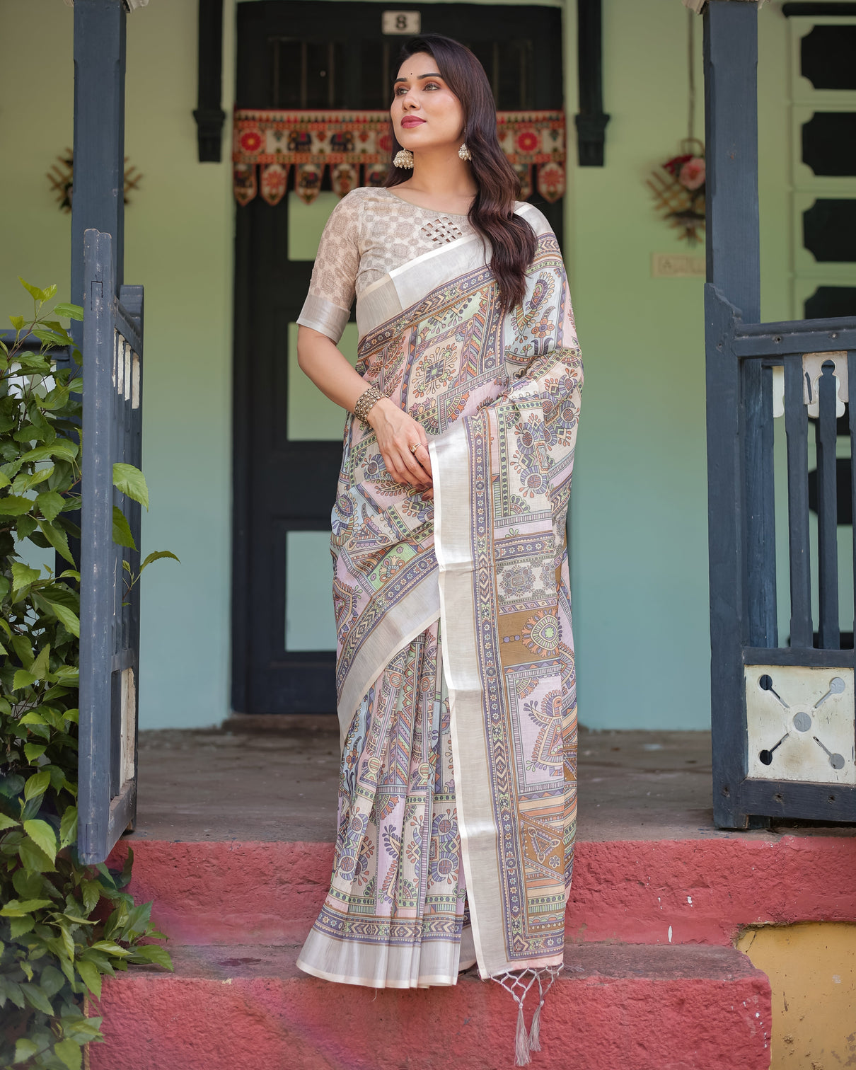 Cream and pastel multicolour printed pure cotton linen saree with blouse and tassels on edges