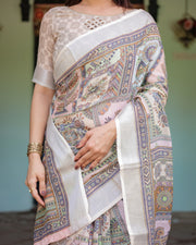 Cream and pastel multicolour printed pure cotton linen saree with blouse and tassels on edges