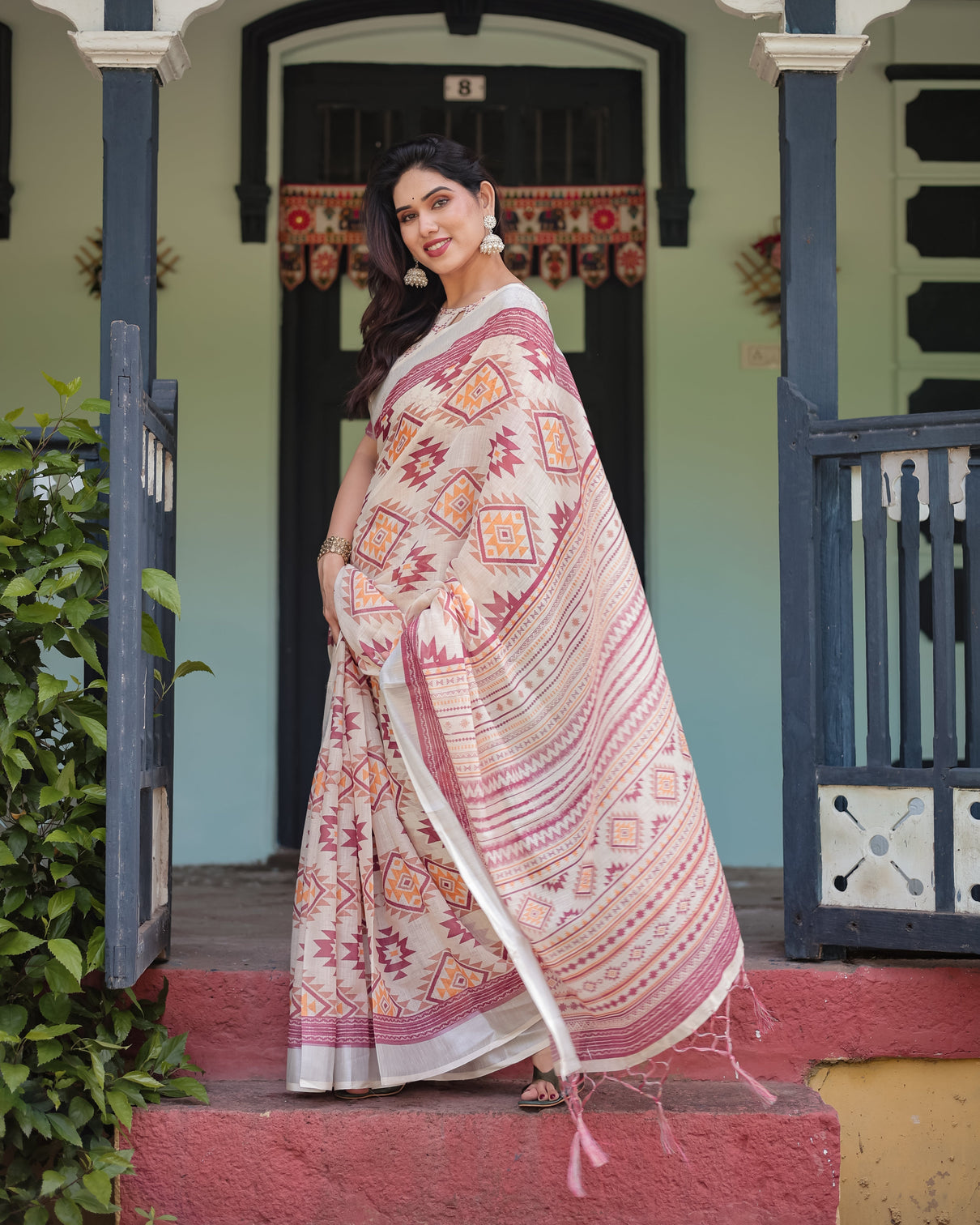 Cream and maroon geometric printed pure cotton linen saree with blouse and tassels