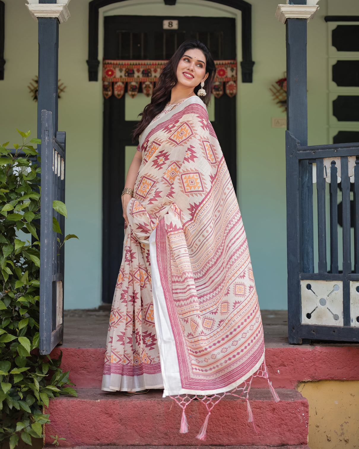 Cream and maroon geometric printed pure cotton linen saree with blouse and tassels
