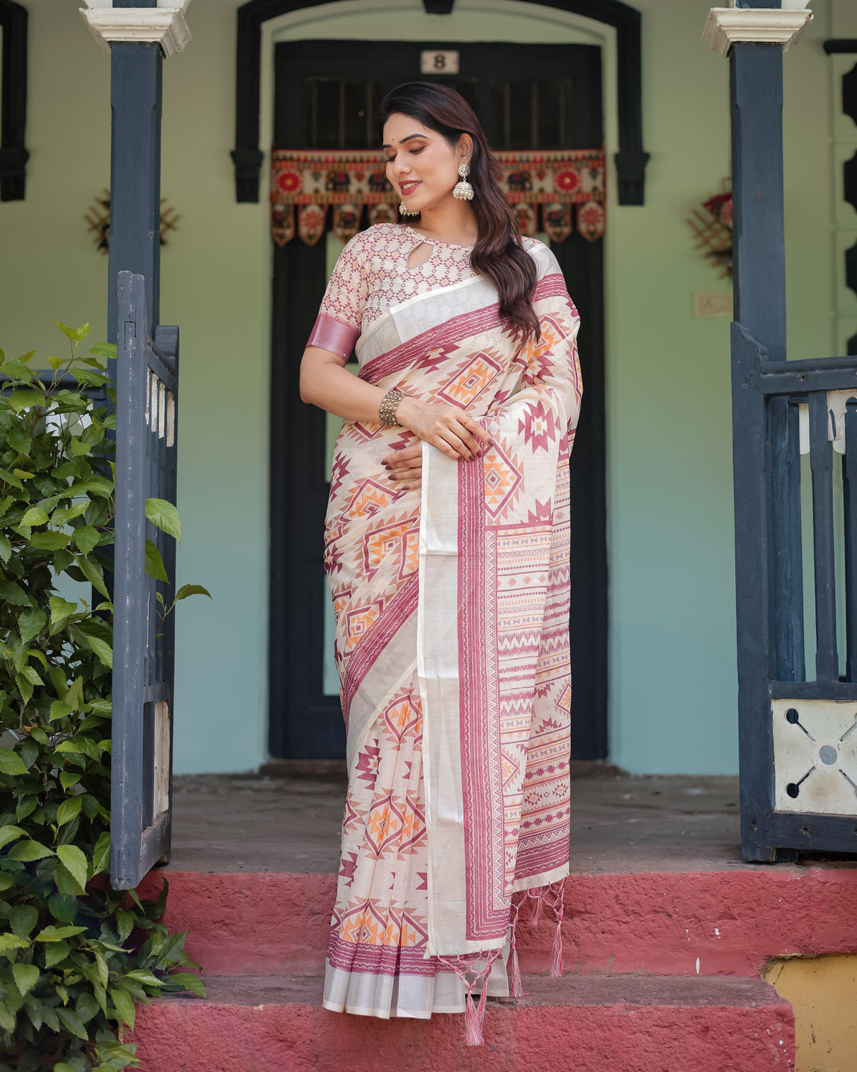 Cream and maroon geometric printed pure cotton linen saree with blouse and tassels