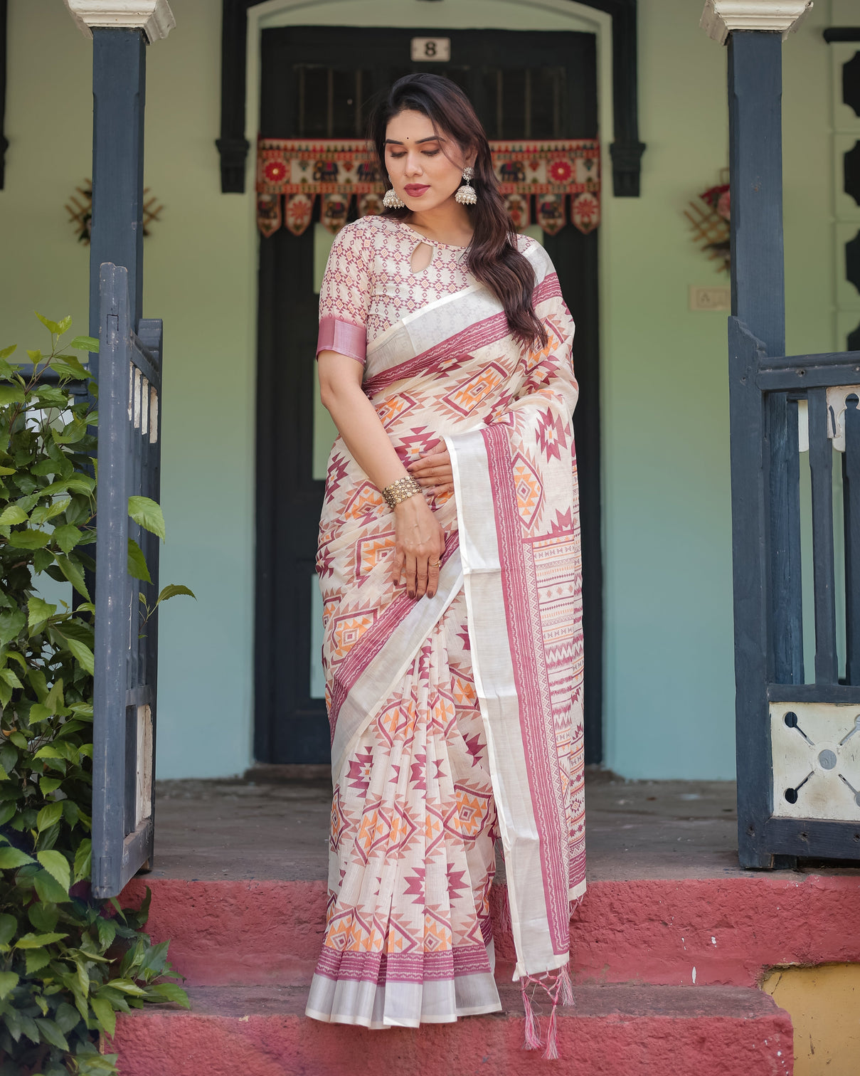 Cream and maroon geometric printed pure cotton linen saree with blouse and tassels