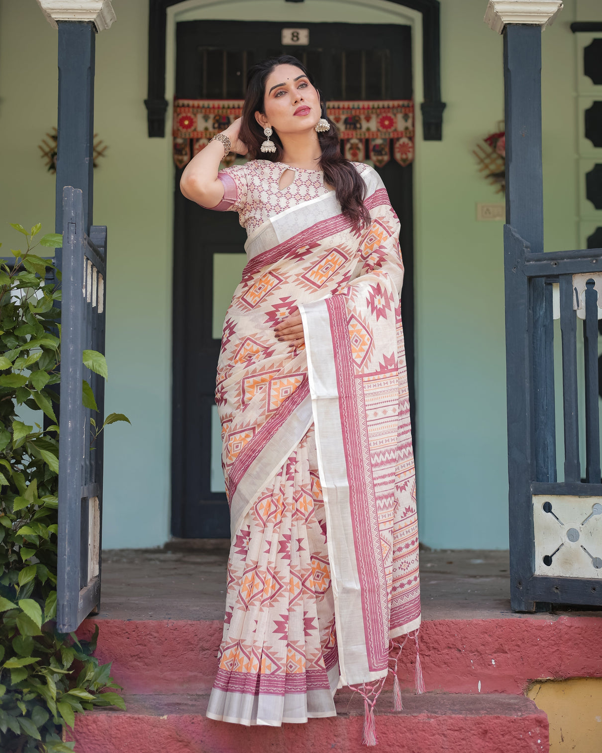 Cream and maroon geometric printed pure cotton linen saree with blouse and tassels