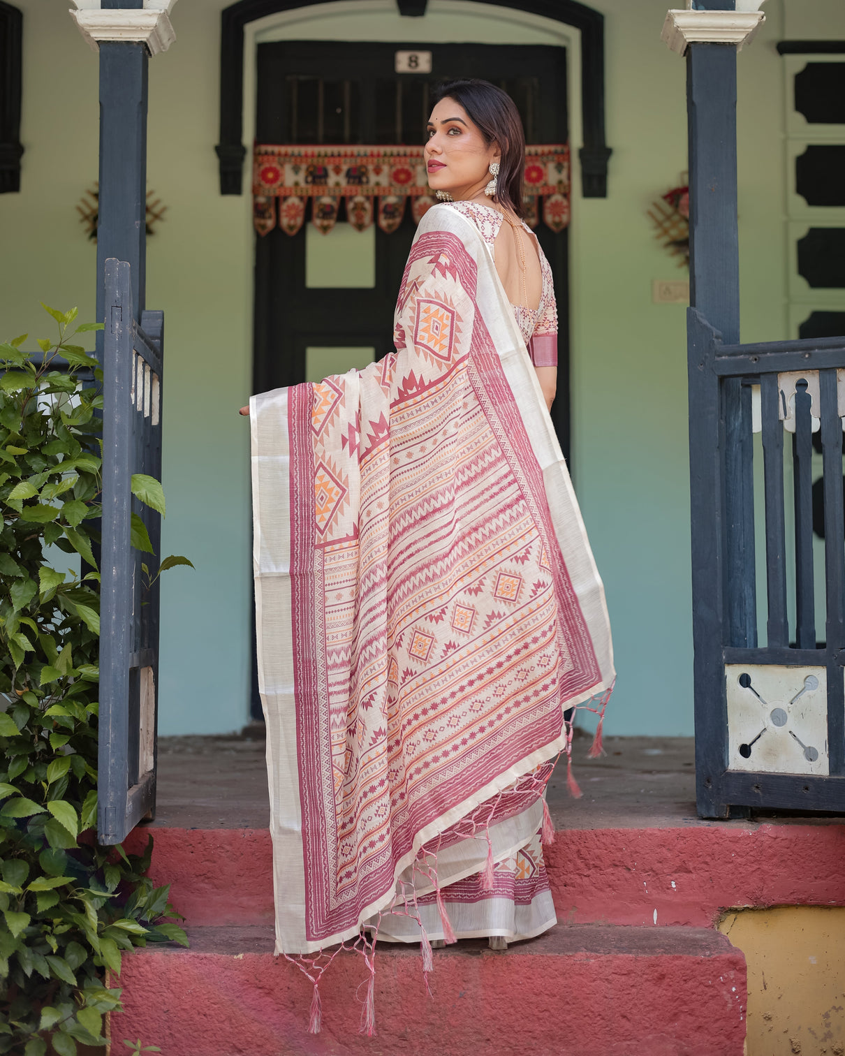 Cream and maroon geometric printed pure cotton linen saree with blouse and tassels
