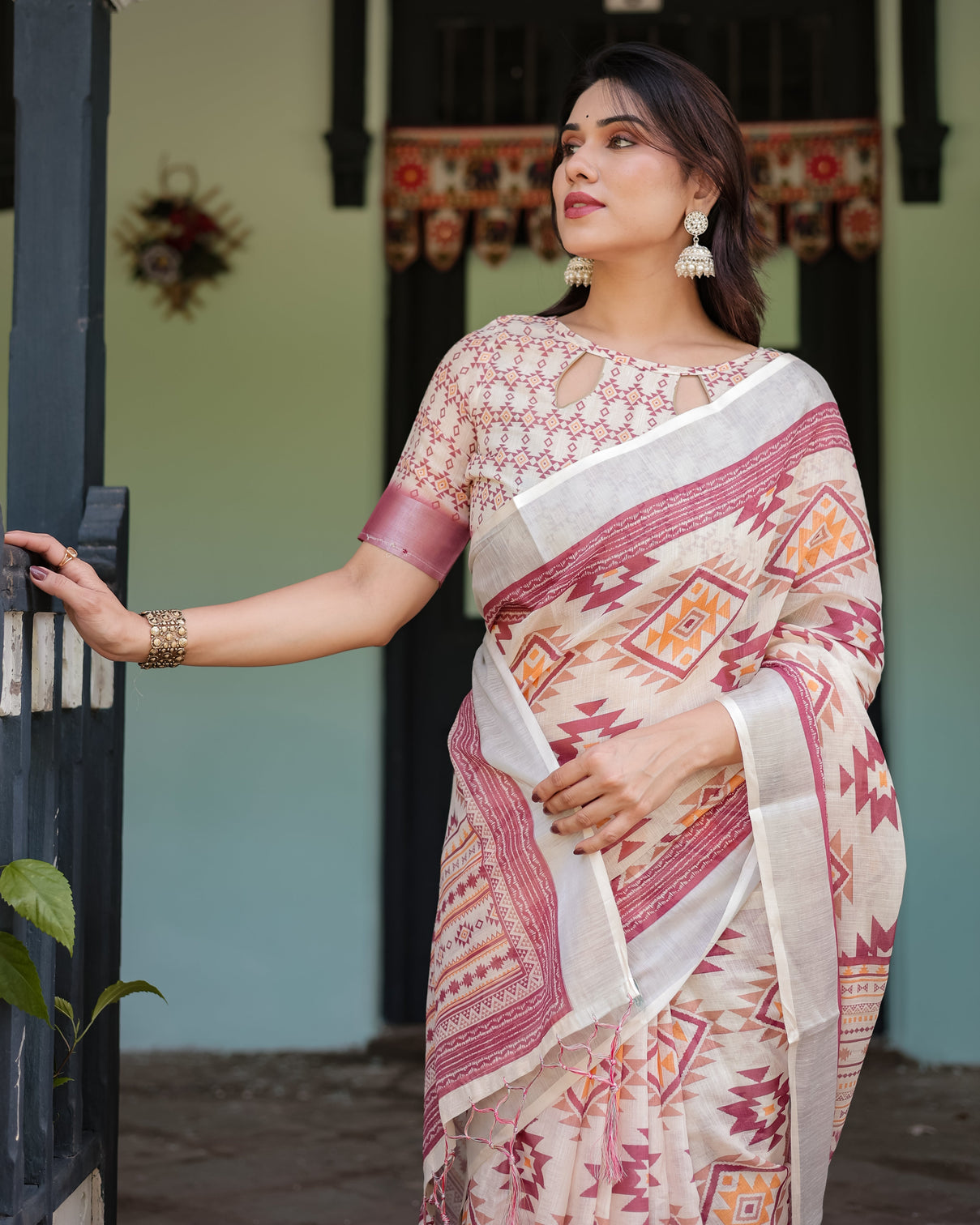 Cream and maroon geometric printed pure cotton linen saree with blouse and tassels