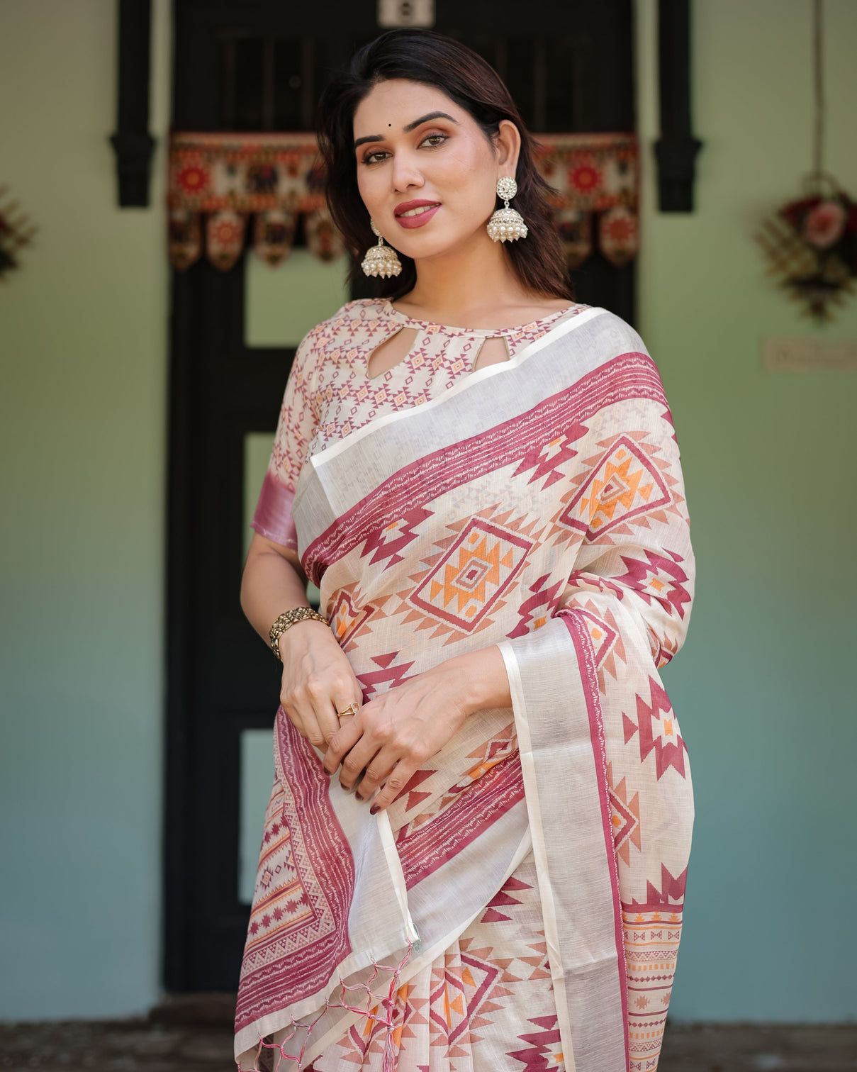 Cream and maroon geometric printed pure cotton linen saree with blouse and tassels