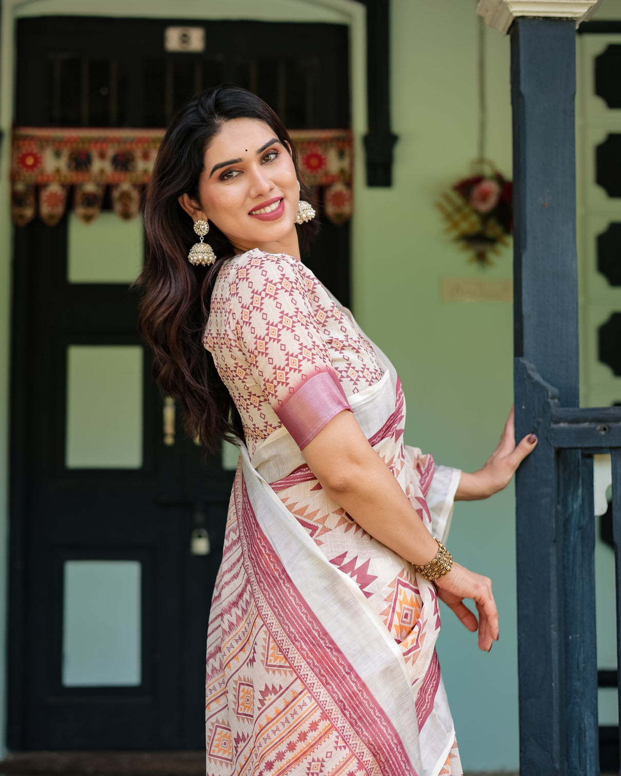 Cream and maroon geometric printed pure cotton linen saree with blouse and tassels