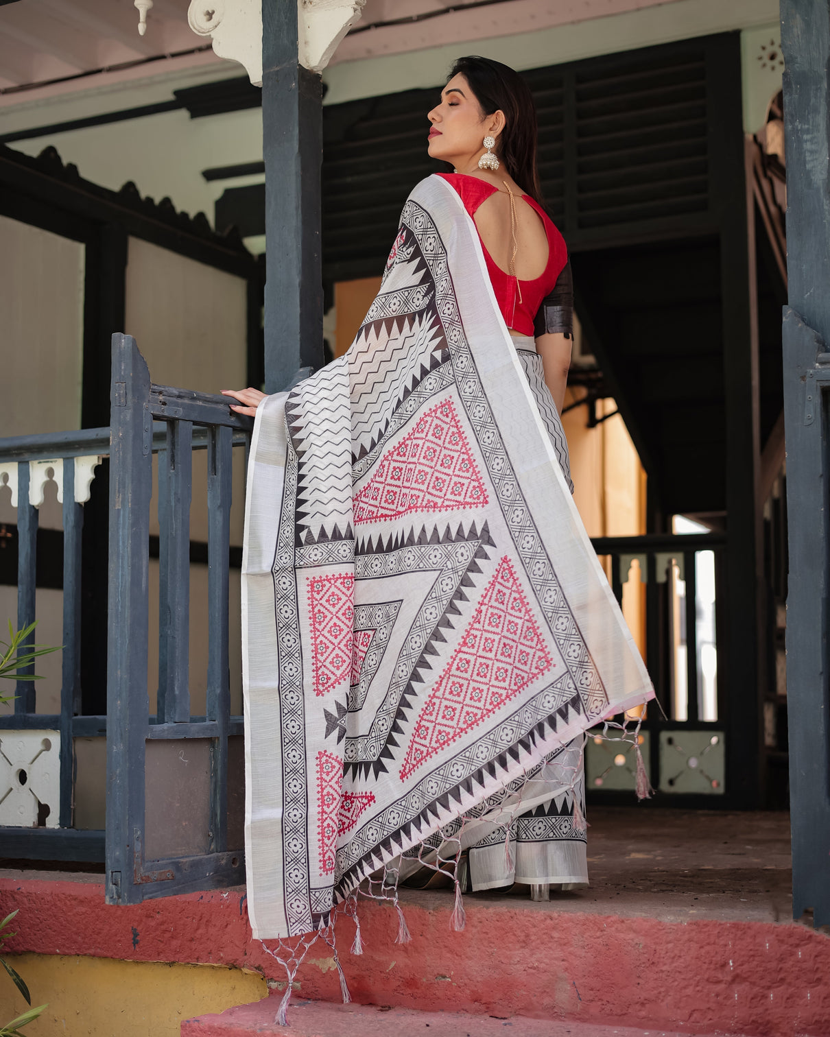 Black and white geometric pattern pure cotton linen saree with red accents blouse and tassel details
