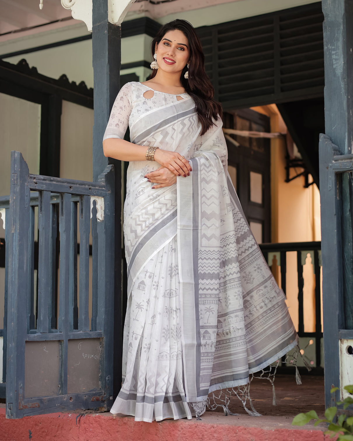 Elegant pure cotton linen saree with intricate grey and white pattern complete with blouse and tassels mameraa