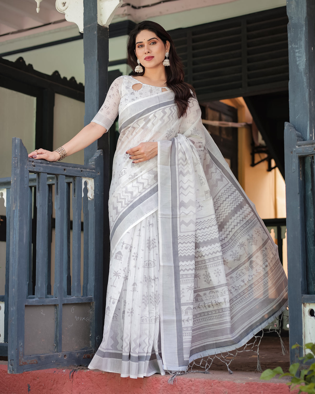 Elegant pure cotton linen saree with intricate grey and white pattern complete with blouse and tassels
