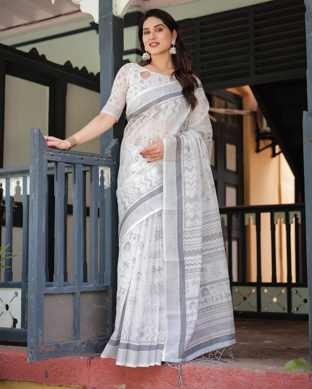 Elegant pure cotton linen saree with intricate grey and white pattern complete with blouse and tassels