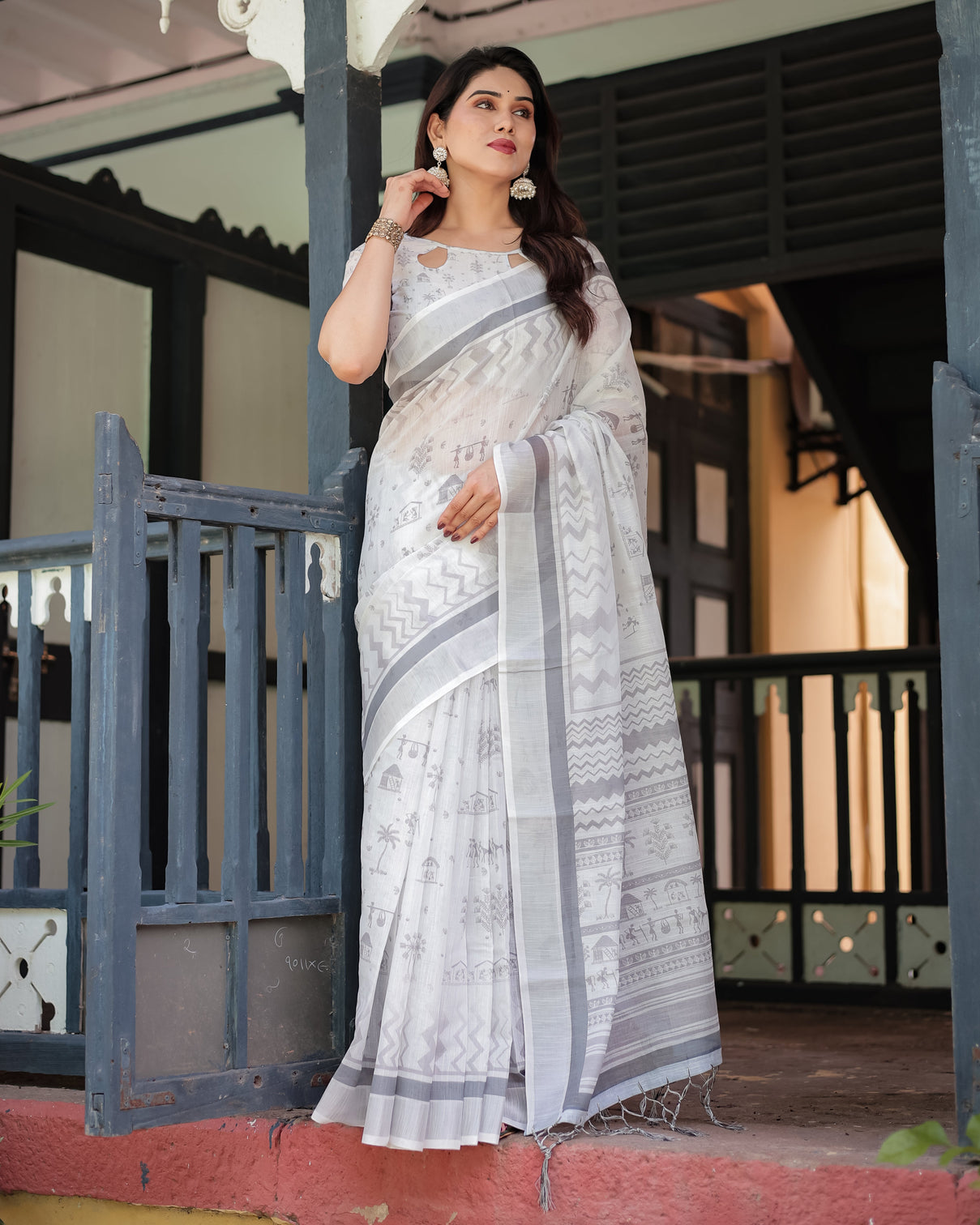 Elegant pure cotton linen saree with intricate grey and white pattern complete with blouse and tassels