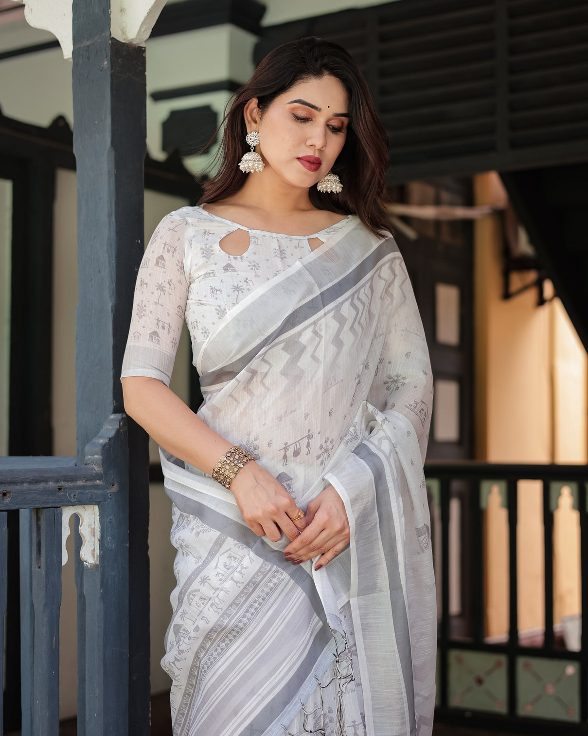 Elegant pure cotton linen saree with intricate grey and white pattern complete with blouse and tassels