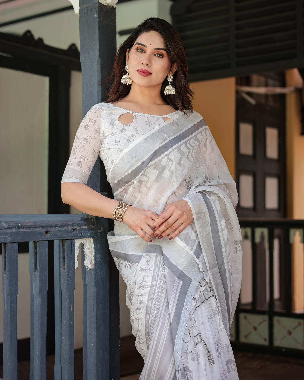 Elegant pure cotton linen saree with intricate grey and white pattern complete with blouse and tassels