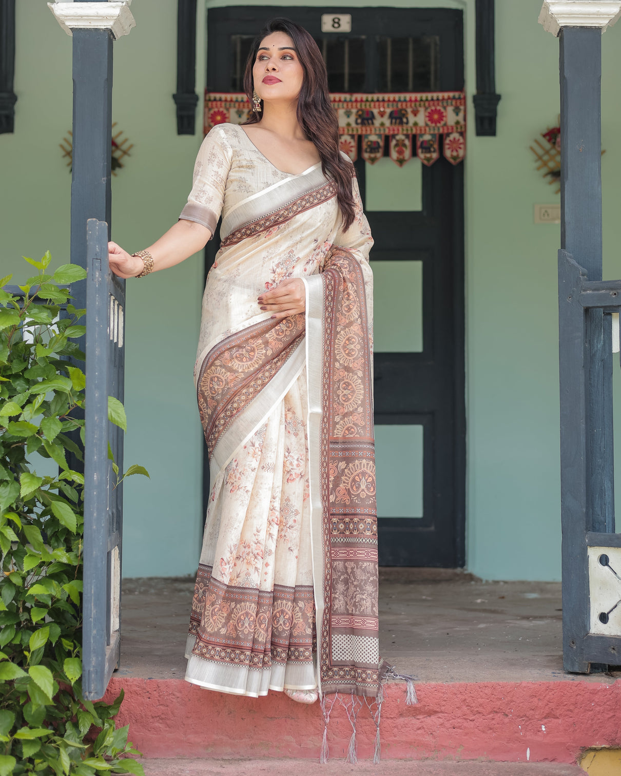 Cream and brown floral print pure cotton linen saree with blouse and tassels on edges