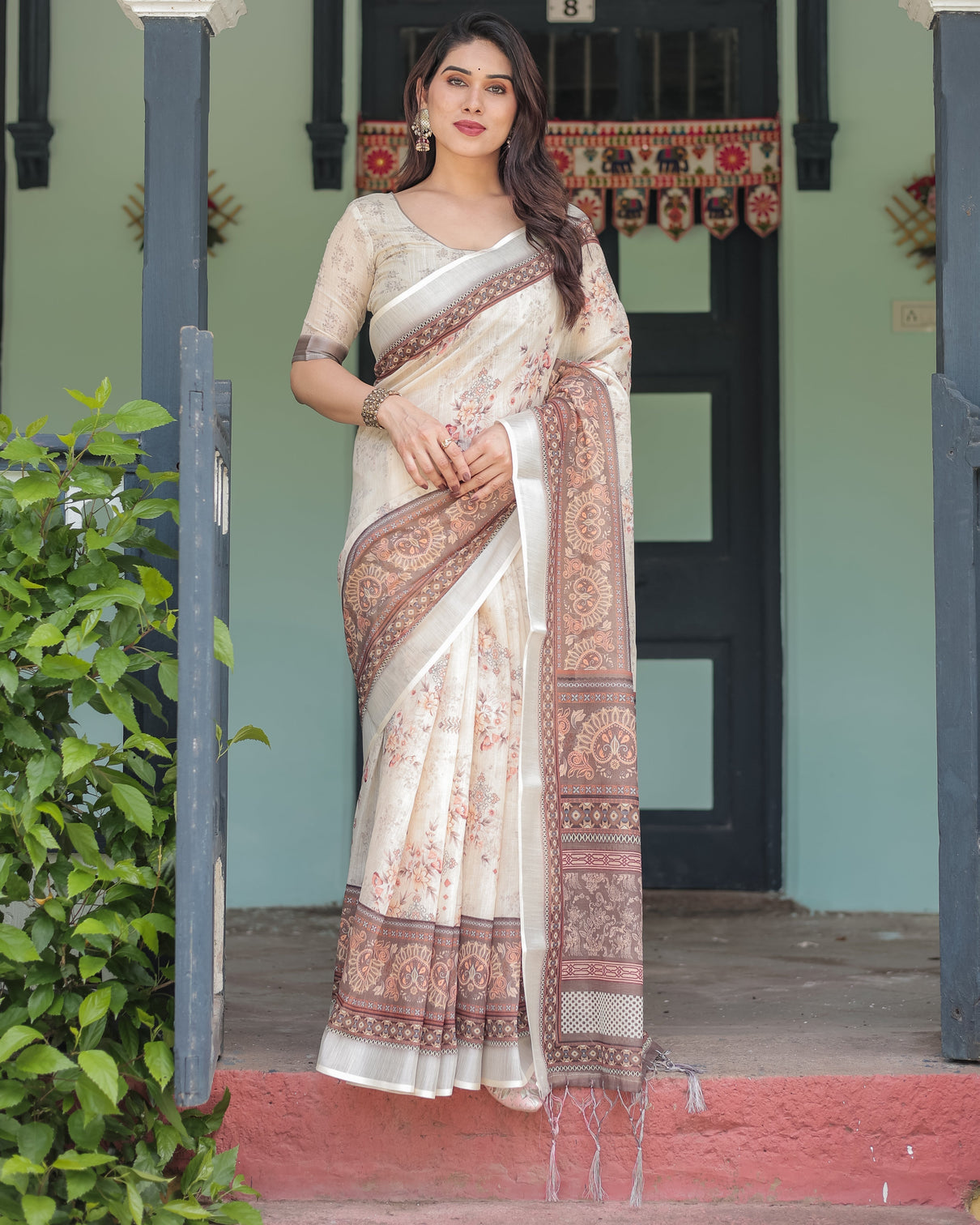 Cream and brown floral print pure cotton linen saree with blouse and tassels on edges