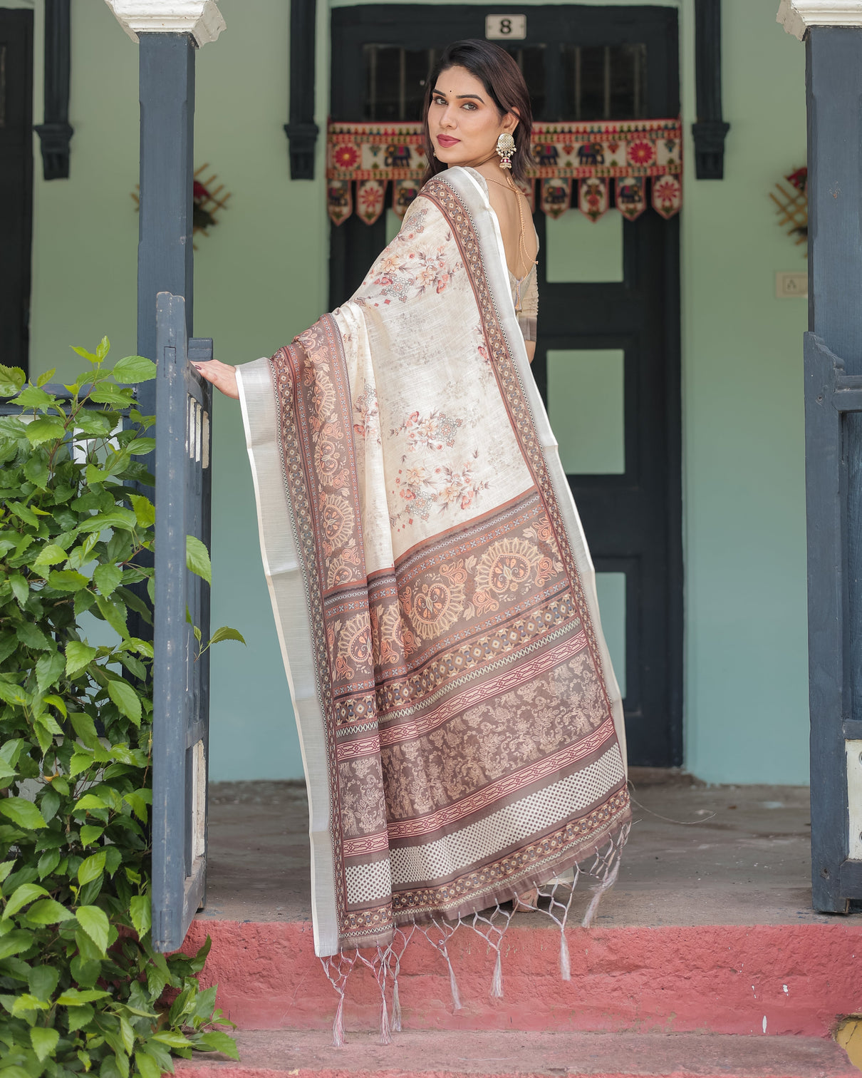 Cream and brown floral print pure cotton linen saree with blouse and tassels on edges