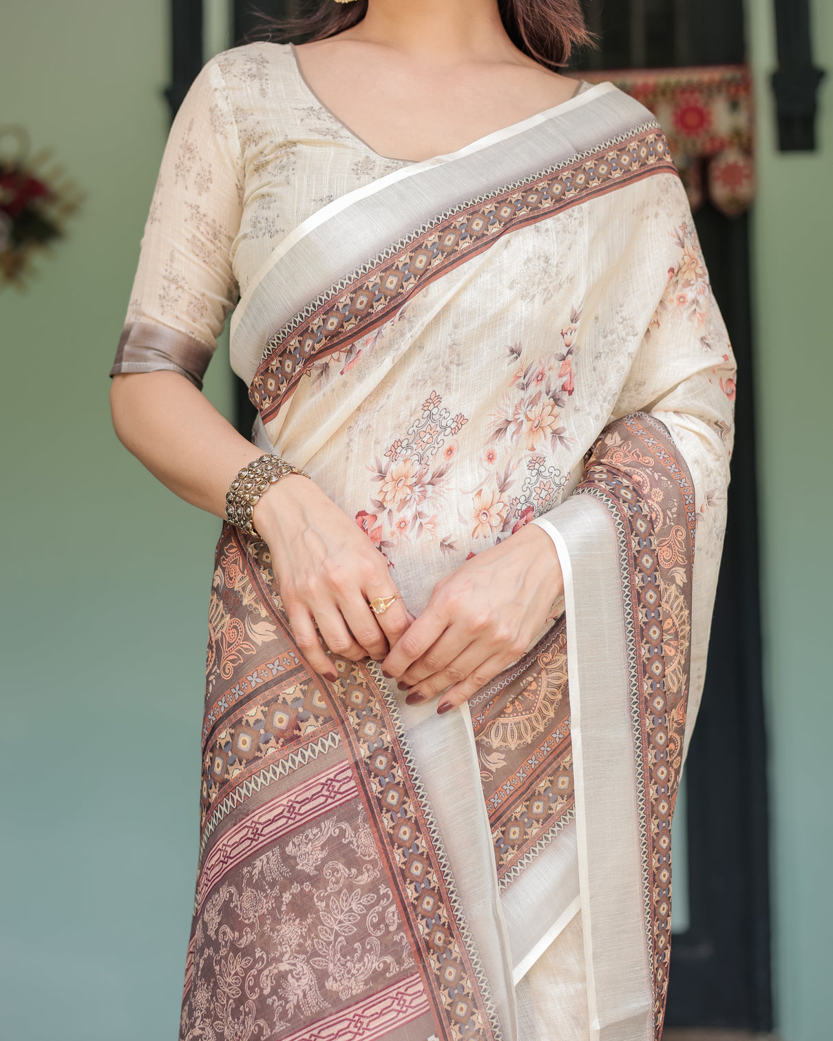 Cream and brown floral print pure cotton linen saree with blouse and tassels on edges