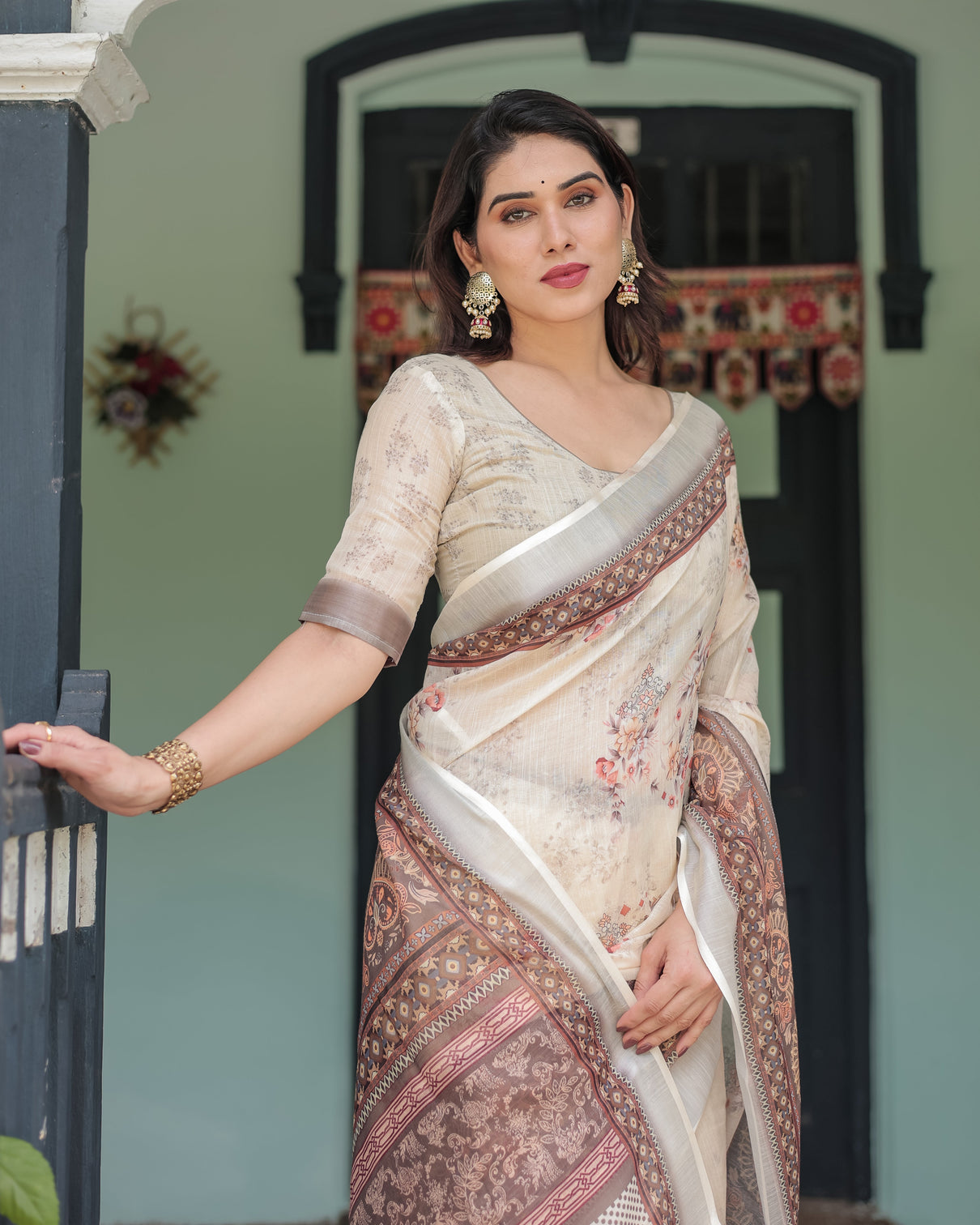 Cream and brown floral print pure cotton linen saree with blouse and tassels on edges
