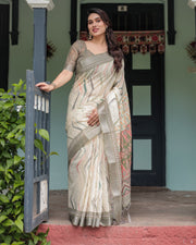 Cream and olive green pure cotton linen saree with floral and geometric print and tassels on edges mameraa