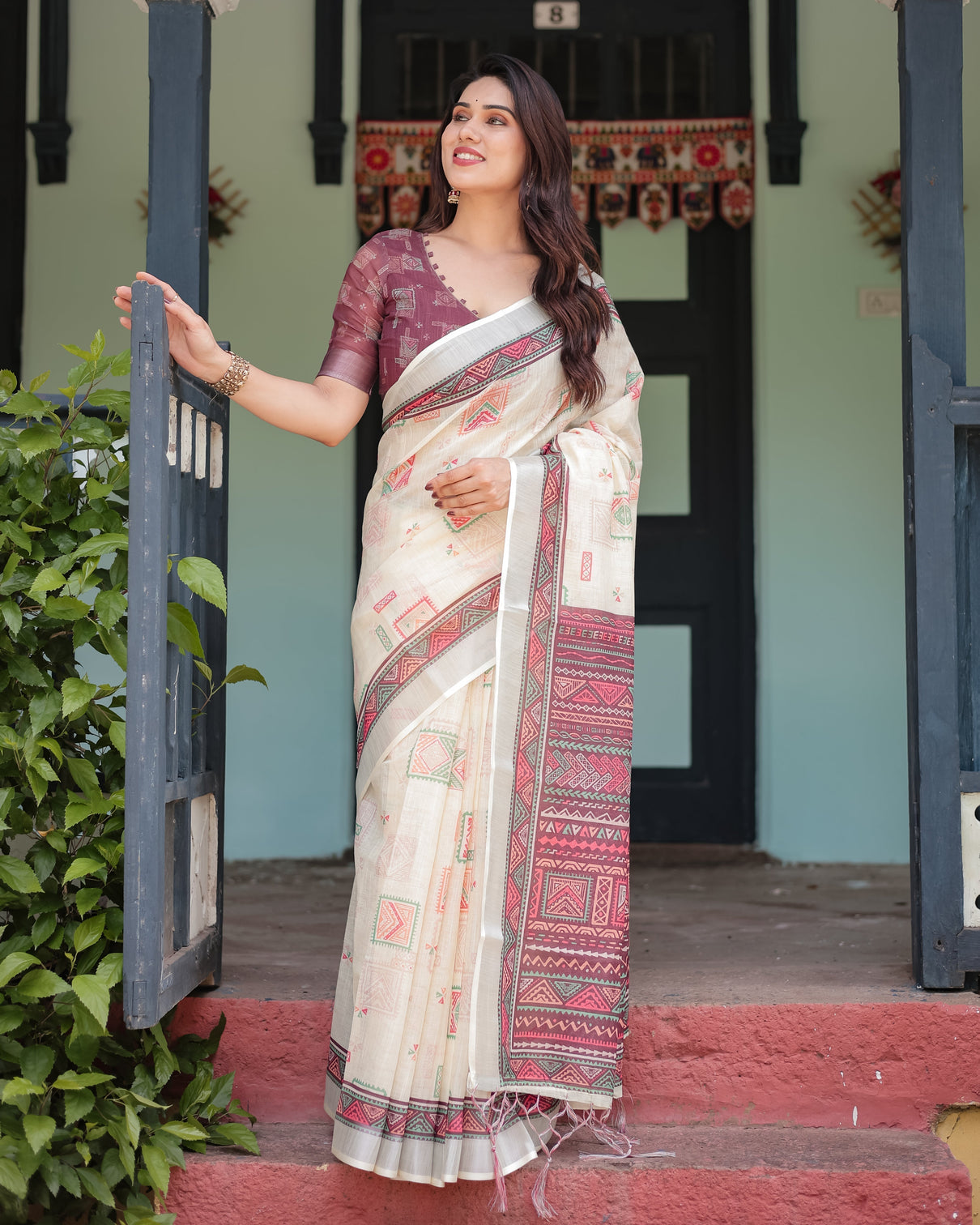 Off white pure cotton linen saree with intricate geometric pattern and tassels on edges