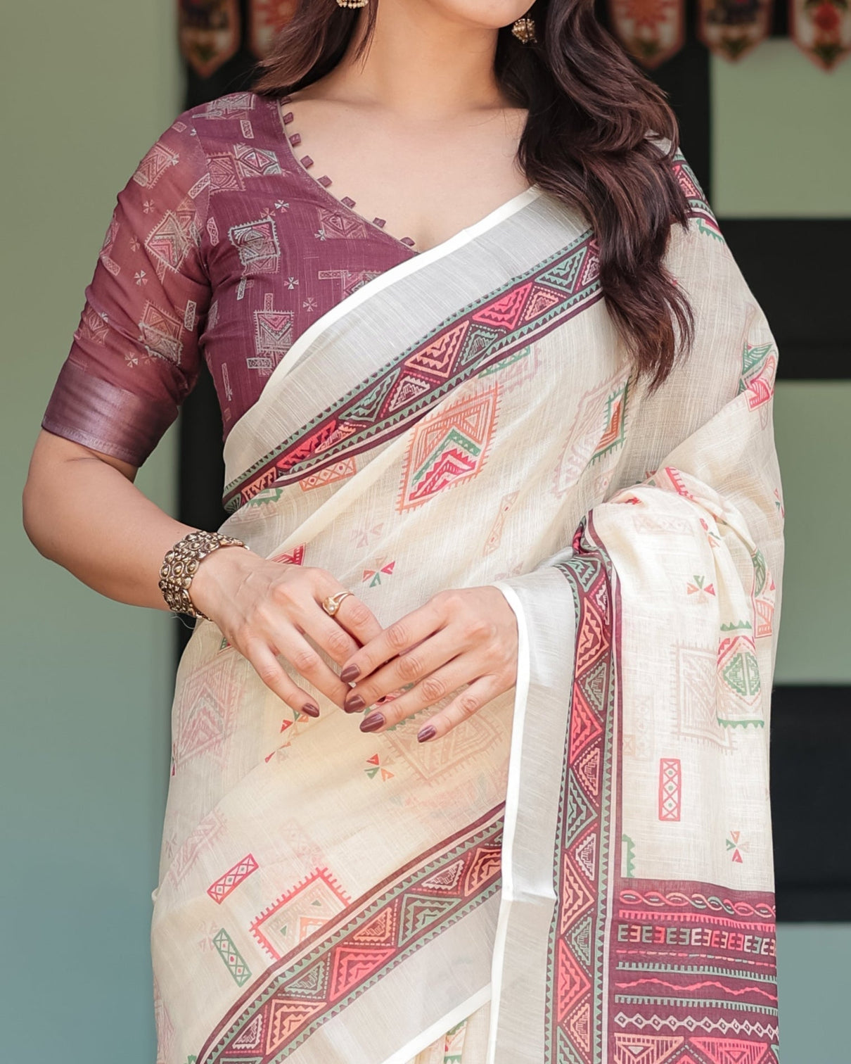Off white pure cotton linen saree with intricate geometric pattern and tassels on edges
