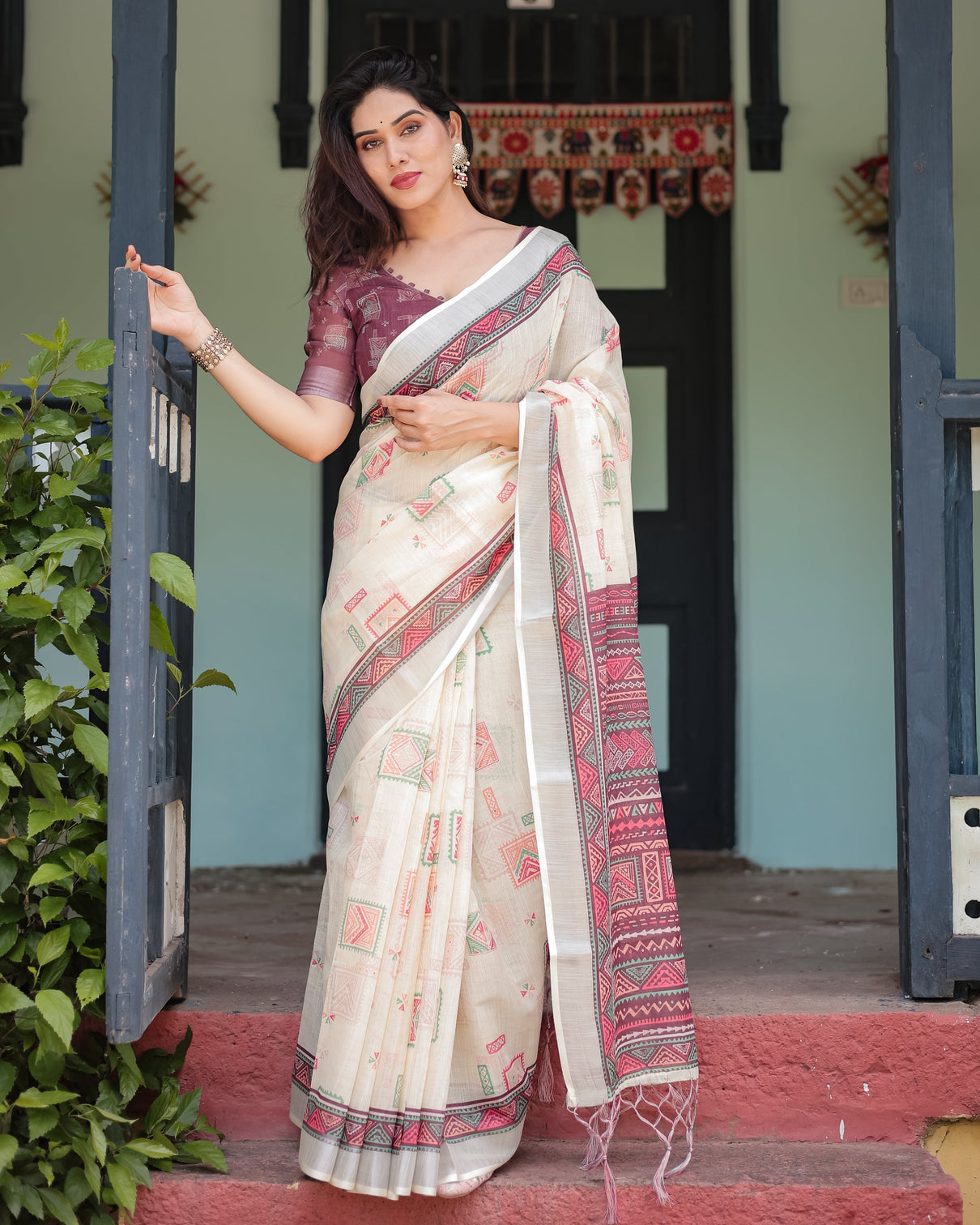 Off white pure cotton linen saree with intricate geometric pattern and tassels on edges