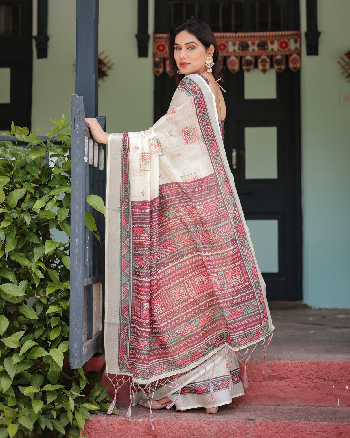 Off white pure cotton linen saree with intricate geometric pattern and tassels on edges