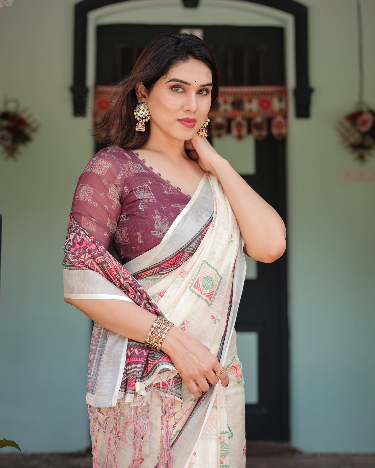 Off white pure cotton linen saree with intricate geometric pattern and tassels on edges
