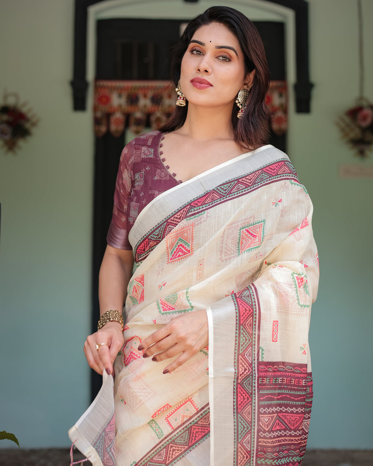Off white pure cotton linen saree with intricate geometric pattern and tassels on edges