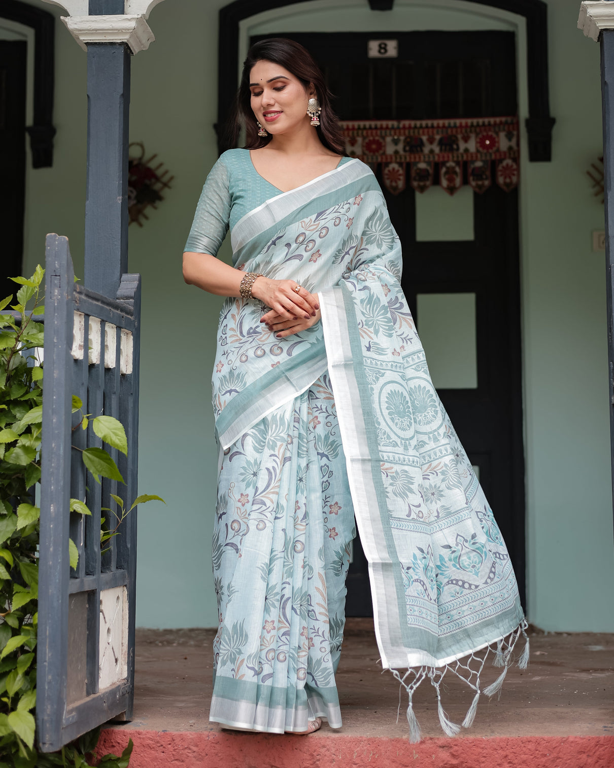 Mint green floral pure cotton linen saree with blouse and tassels