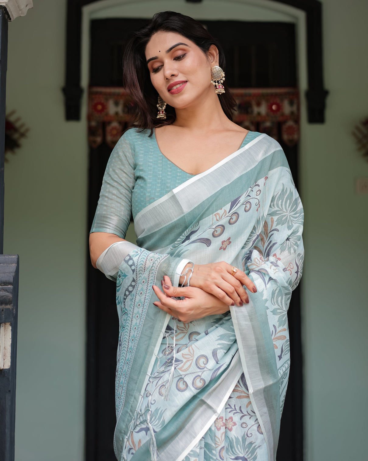 Mint green floral pure cotton linen saree with blouse and tassels