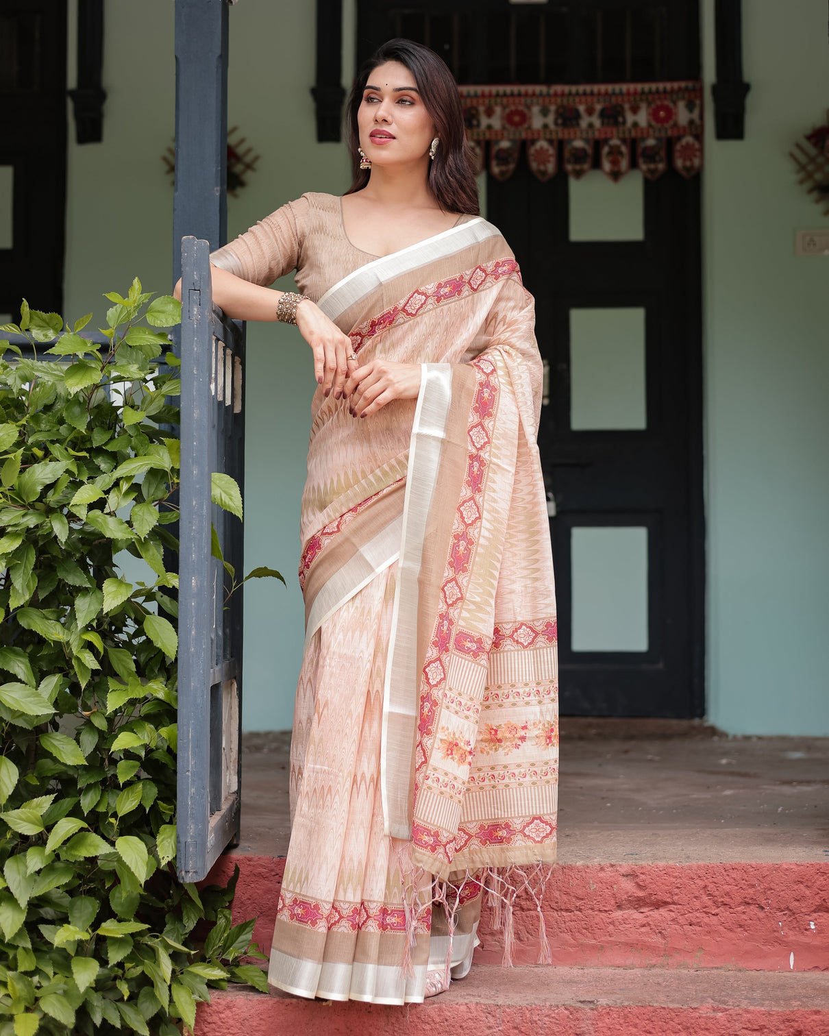 Beige and pink floral printed pure cotton linen saree with blouse and tassels on edges