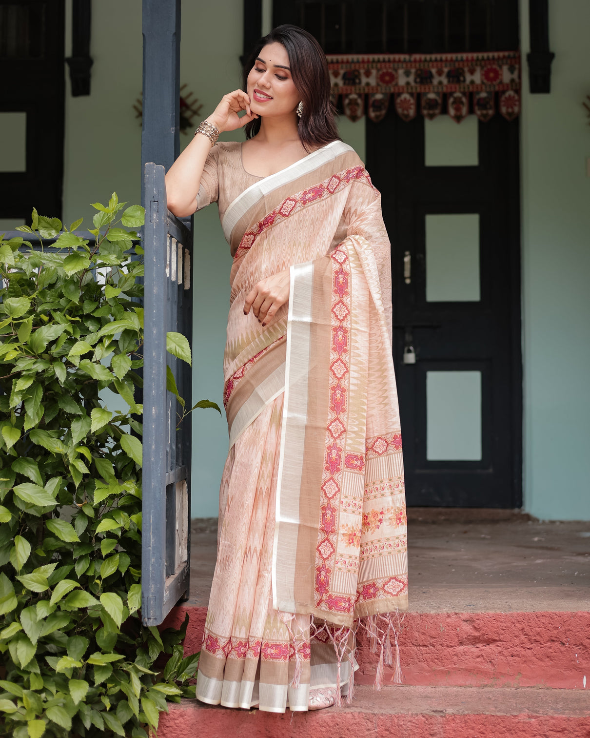 Beige and pink floral printed pure cotton linen saree with blouse and tassels on edges