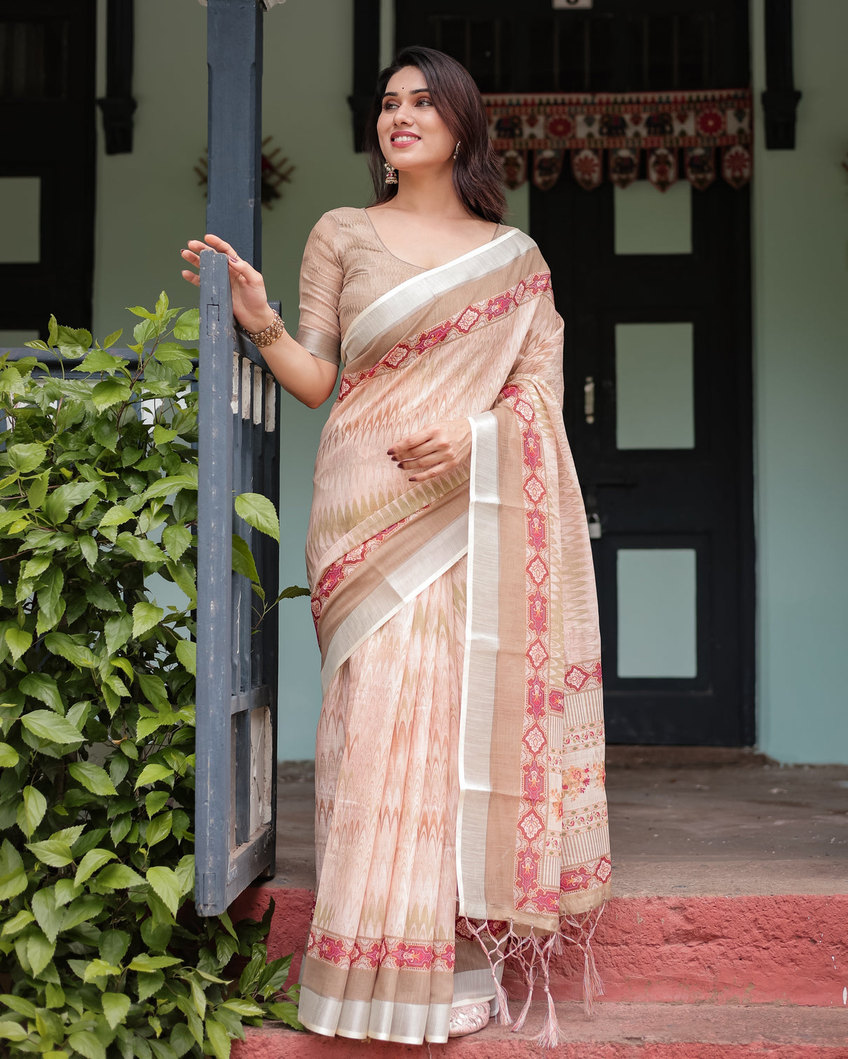 Beige and pink floral printed pure cotton linen saree with blouse and tassels on edges