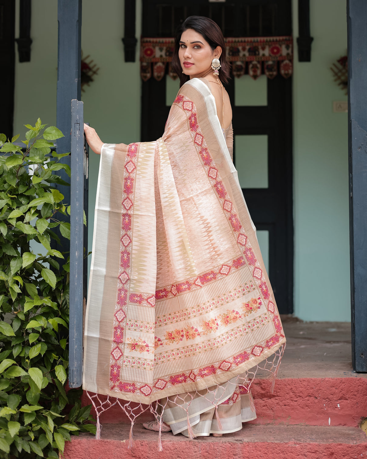 Beige and pink floral printed pure cotton linen saree with blouse and tassels on edges