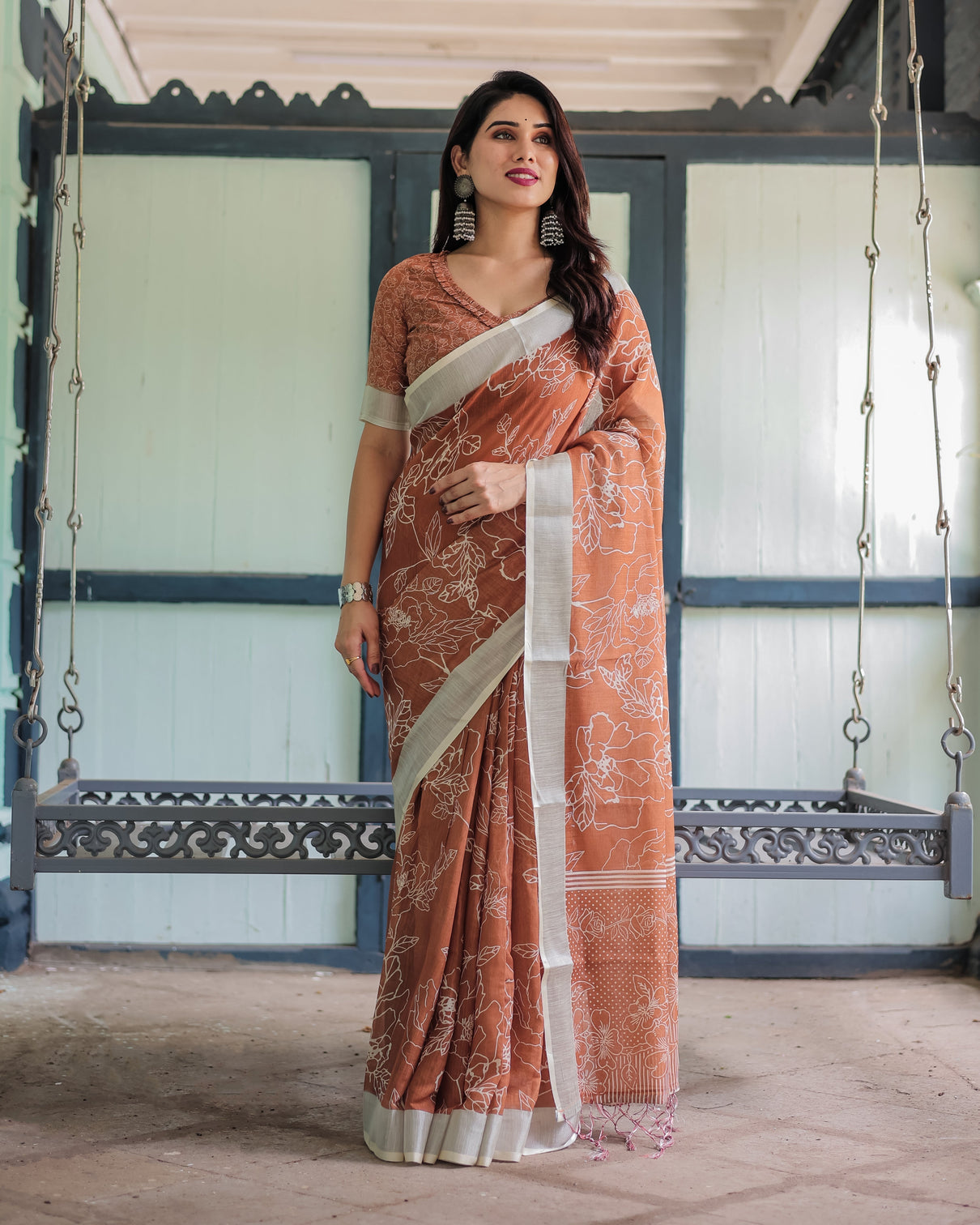 Terracotta brown floral handprinted pure cotton linen saree with tassels mameraa