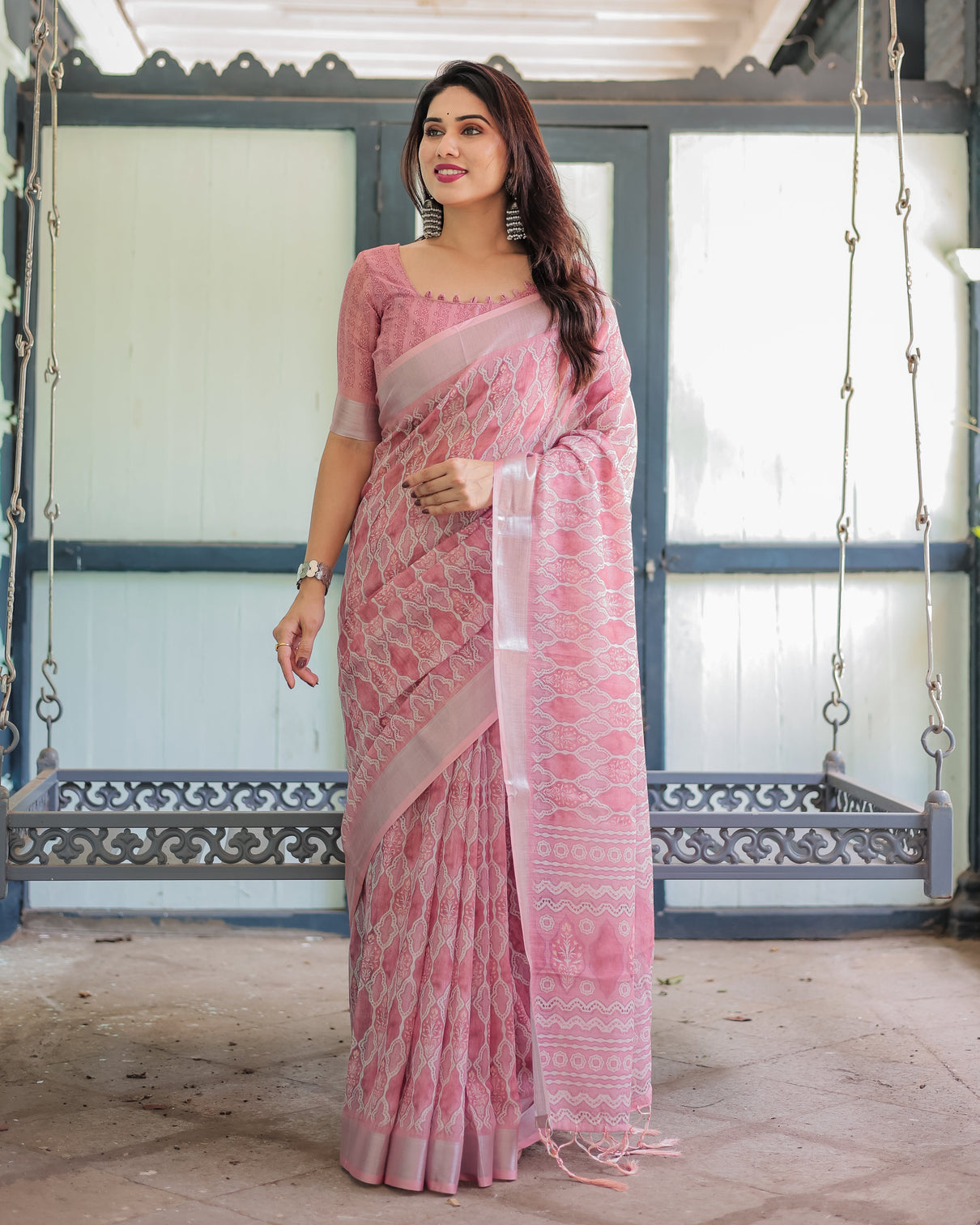 Elegant rose pink pure cotton linen saree with white thread work matching blouse and tassel edges