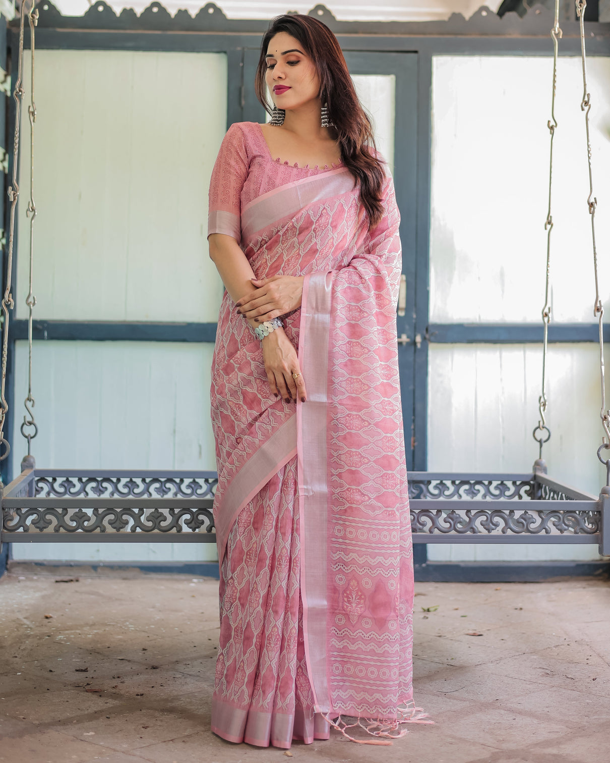 Elegant rose pink pure cotton linen saree with white thread work matching blouse and tassel edges