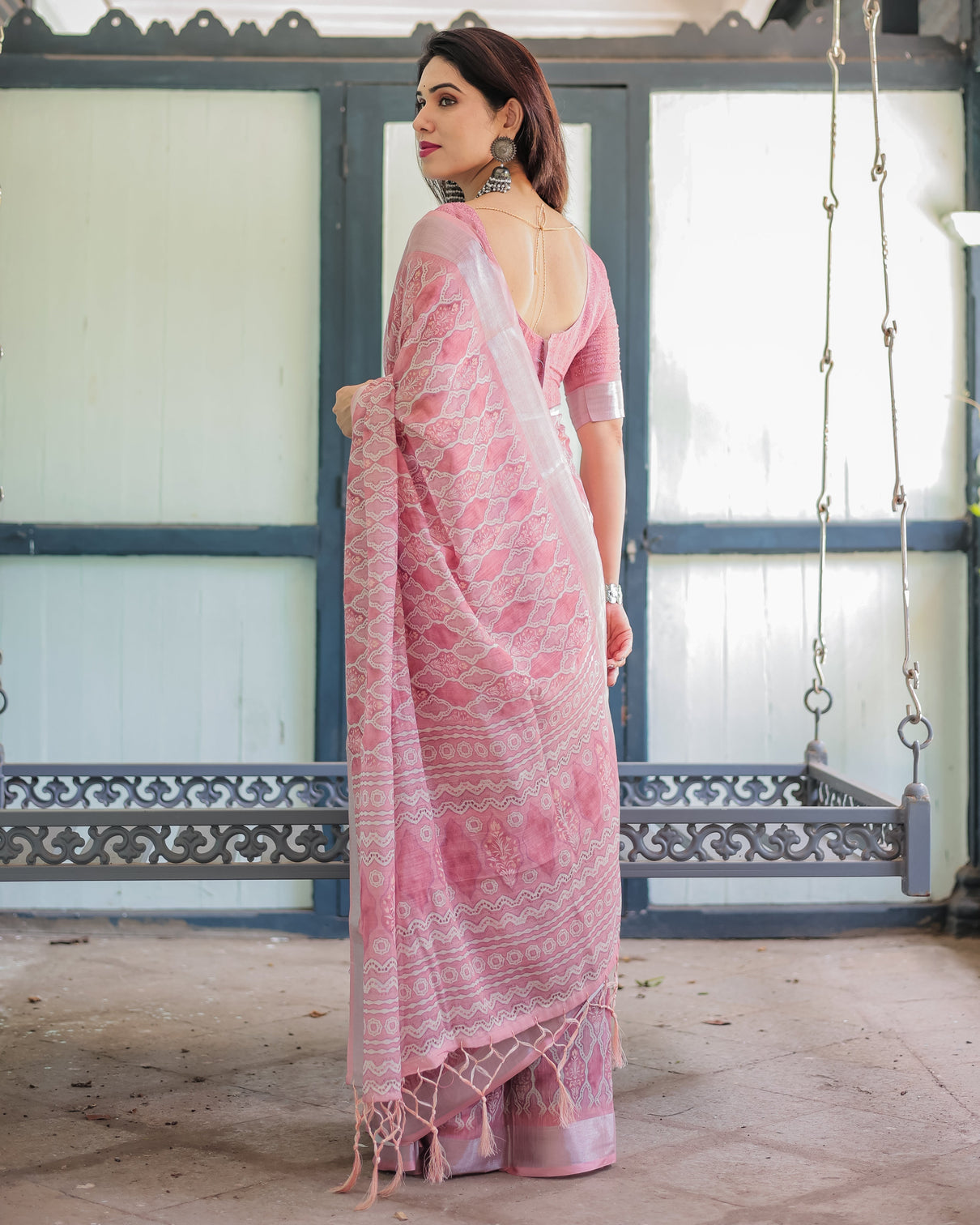 Elegant rose pink pure cotton linen saree with white thread work matching blouse and tassel edges