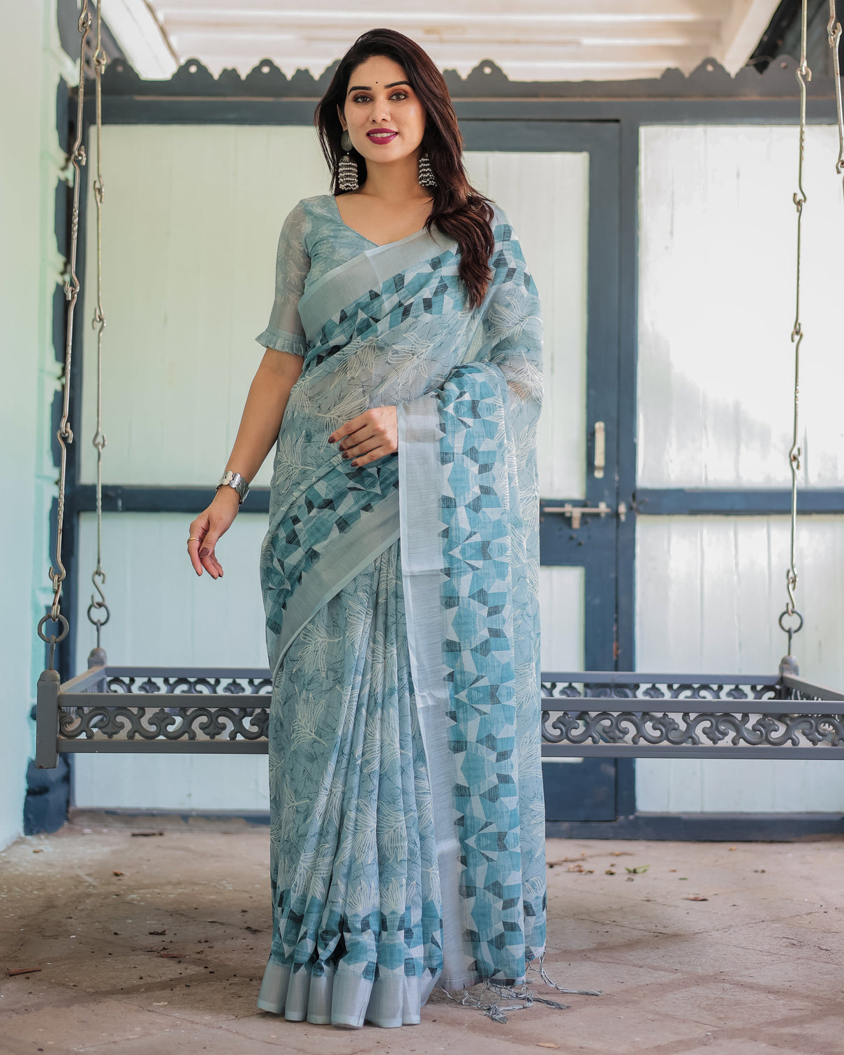 Light blue pure cotton linen saree with geometric and floral patterns blouse and tassels mameraa