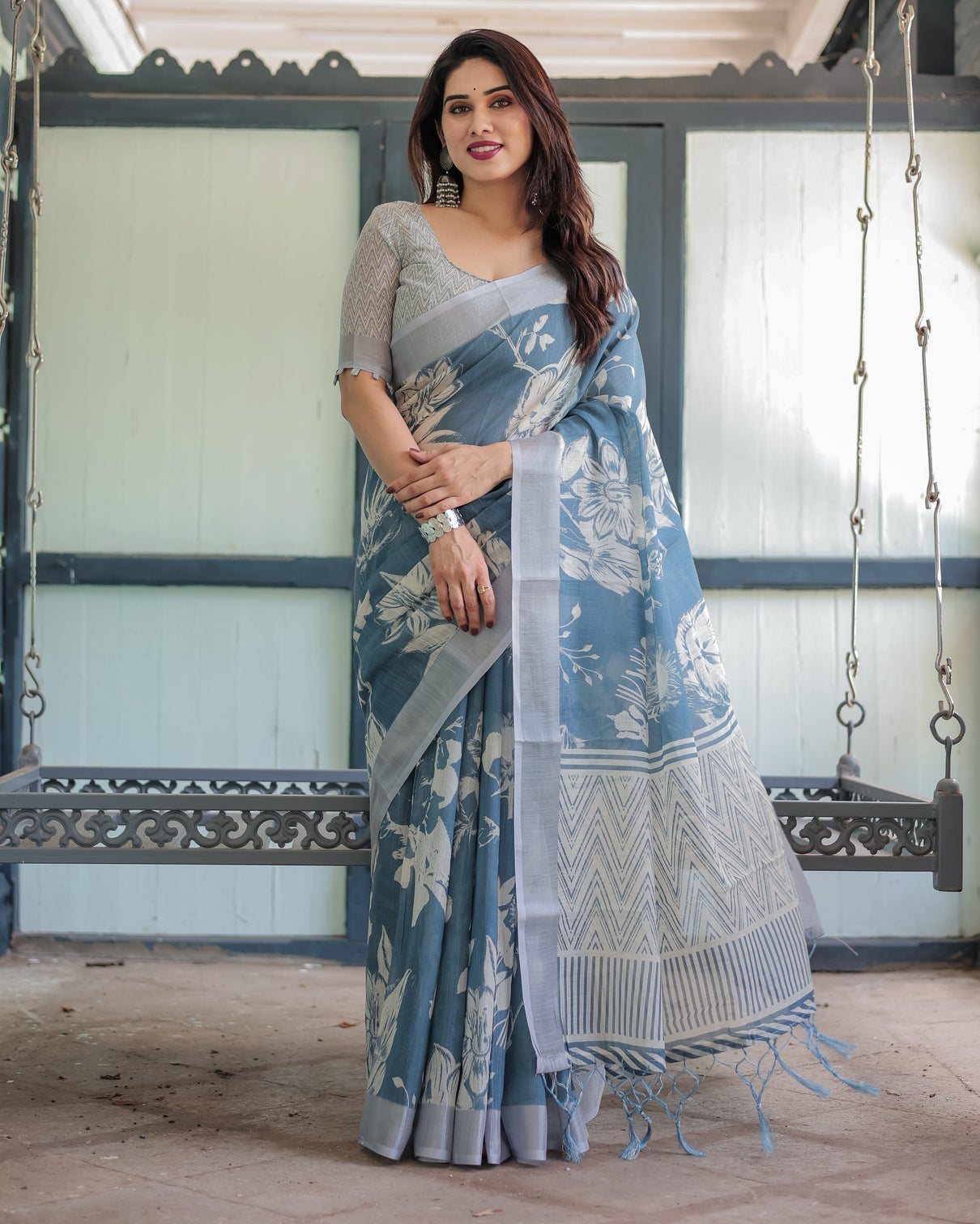 Pastel blue floral and geometric printed cotton linen saree with blouse and tassel edges mameraa