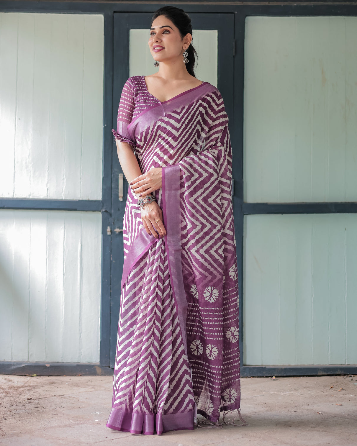 Purple and white zigzag patterned pure cotton linen saree with blouse and tassel edges
