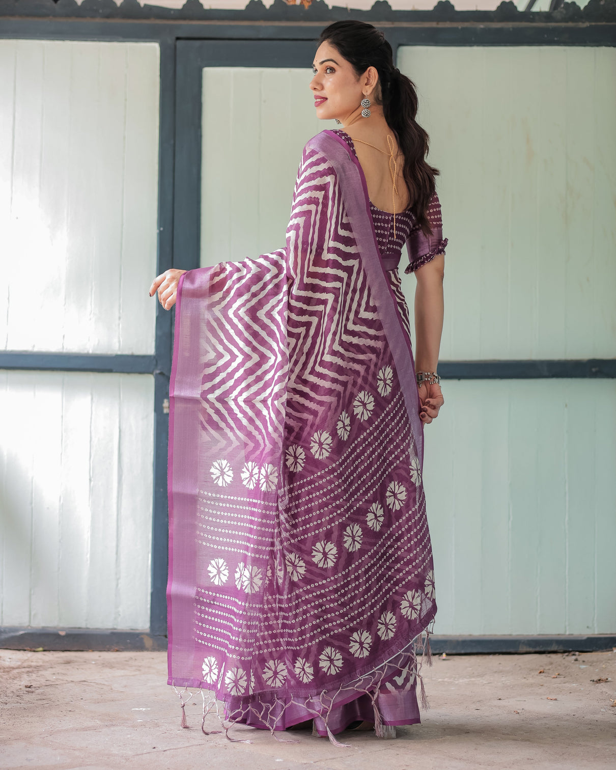 Purple and white zigzag patterned pure cotton linen saree with blouse and tassel edges