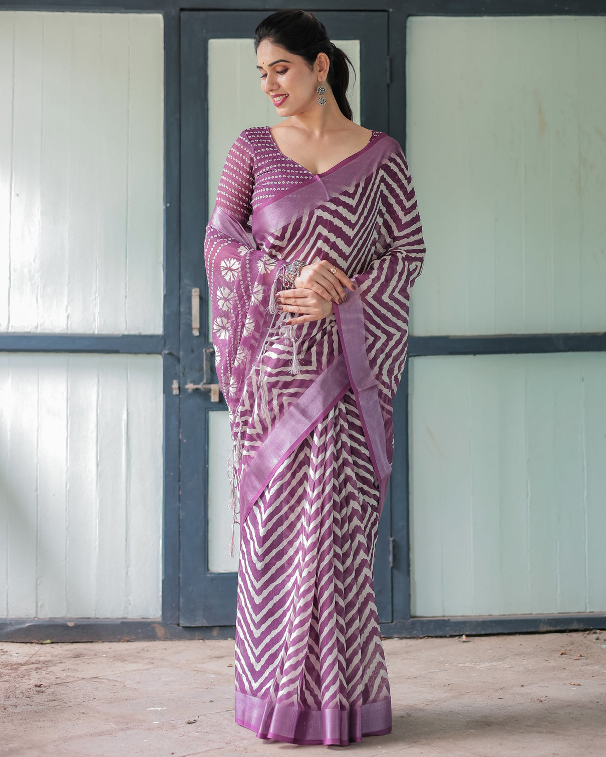 Purple and white zigzag patterned pure cotton linen saree with blouse and tassel edges