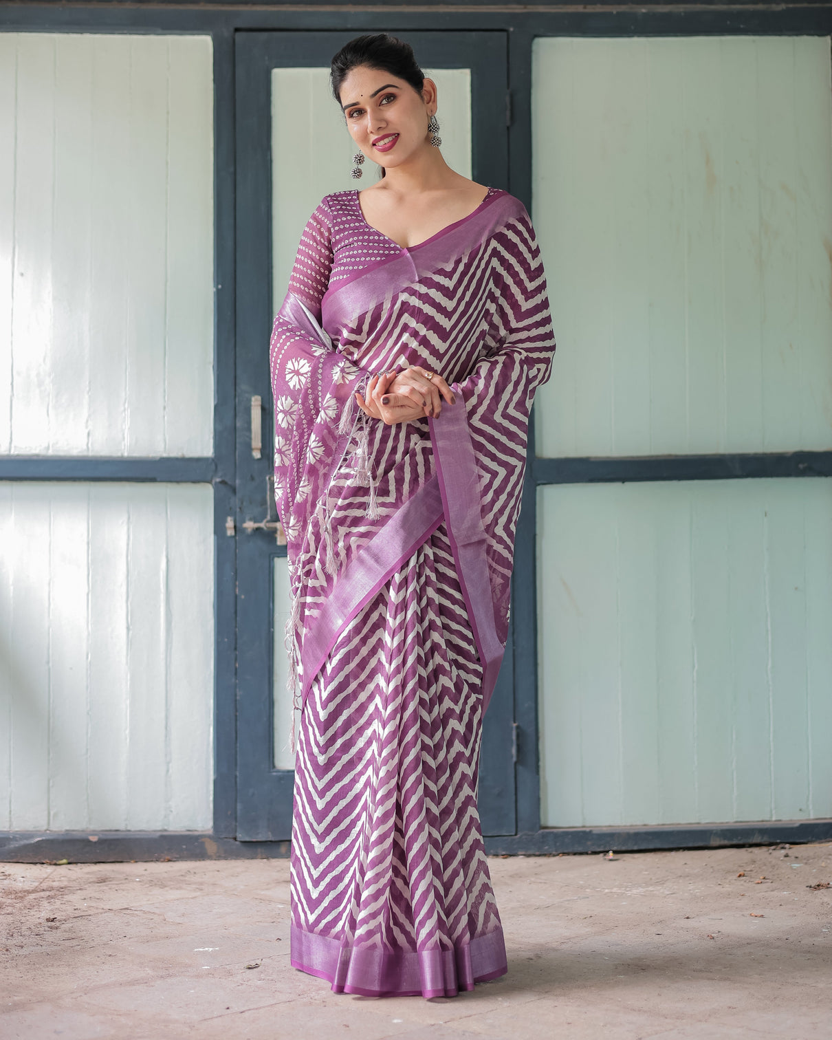 Purple and white zigzag patterned pure cotton linen saree with blouse and tassel edges